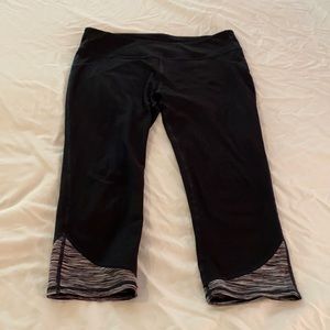 Fabletics capri black leggings w/ ankle detail.EUC